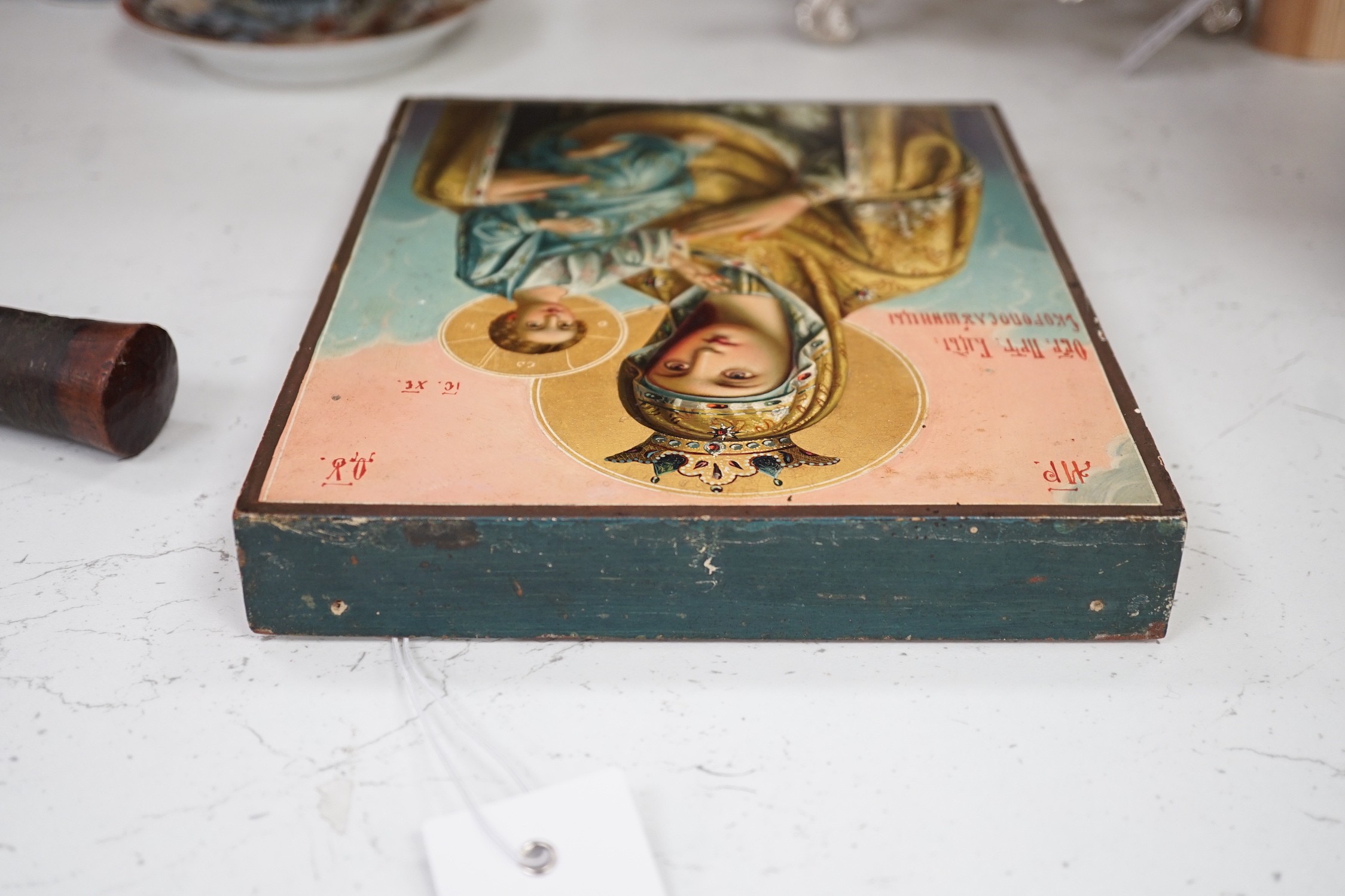 A Russian painted wood icon of Virgin and child, 22.5x18cm